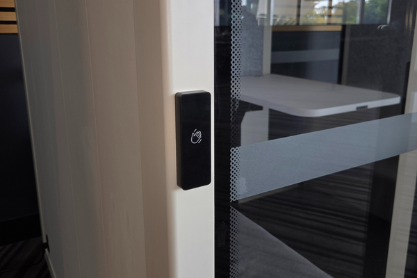 Close-up view of the automatic sensor used to open and close the door of the Bureau Booth, enhancing accessibility for all users